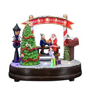 Scène de Noël animée, musicale & lumineuse Distribution de cadeaux- Déco de village - L 21.5 x H 18.5 x l 16 cm - Multicolore