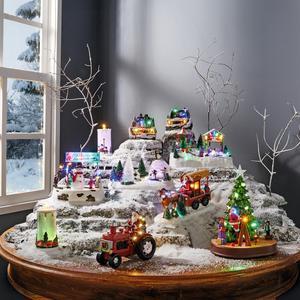 Père Noël sur tracteur musical & lumineux à fausse fumée - 18 x 10 x 14 cm - Multicolore - FAIRY STARS
