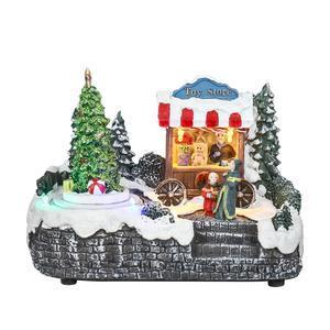 Scène de Noël animée & lumineuse Marchand de jouets  - Déco de village - L 18 x H 14.5 x l 10 cm - Multicolore