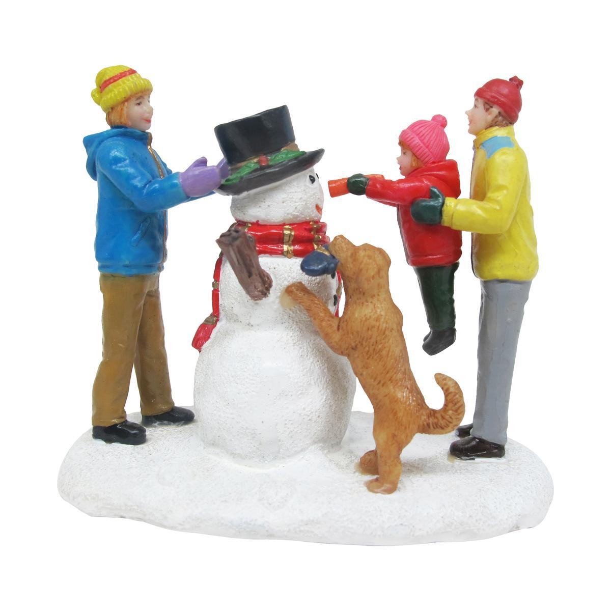 Figurine village de Noël - Polyrésine - 8,5 x 4,7 x H 7,2 cm - Multicolore